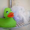 items stored on shower caddies fall and can cause chips or impact cracks.