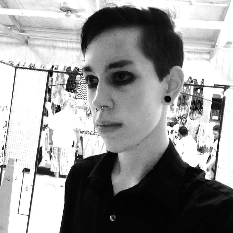 a picture of Mad Man Mo in black and white at a Monday Pop-up Artshow