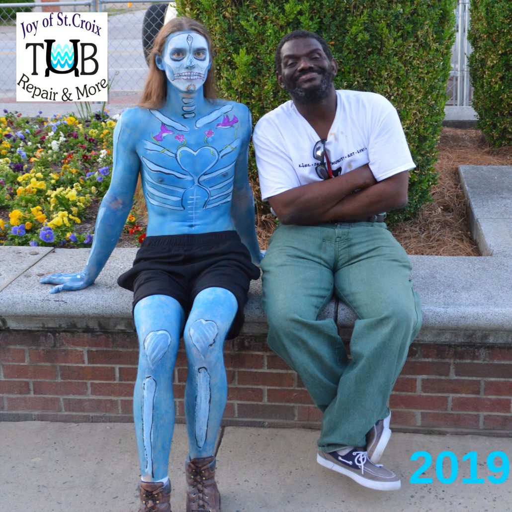 Jaym-E from Joy of St Croix portrays a Mocko Jumbie at Par-T-On the Green