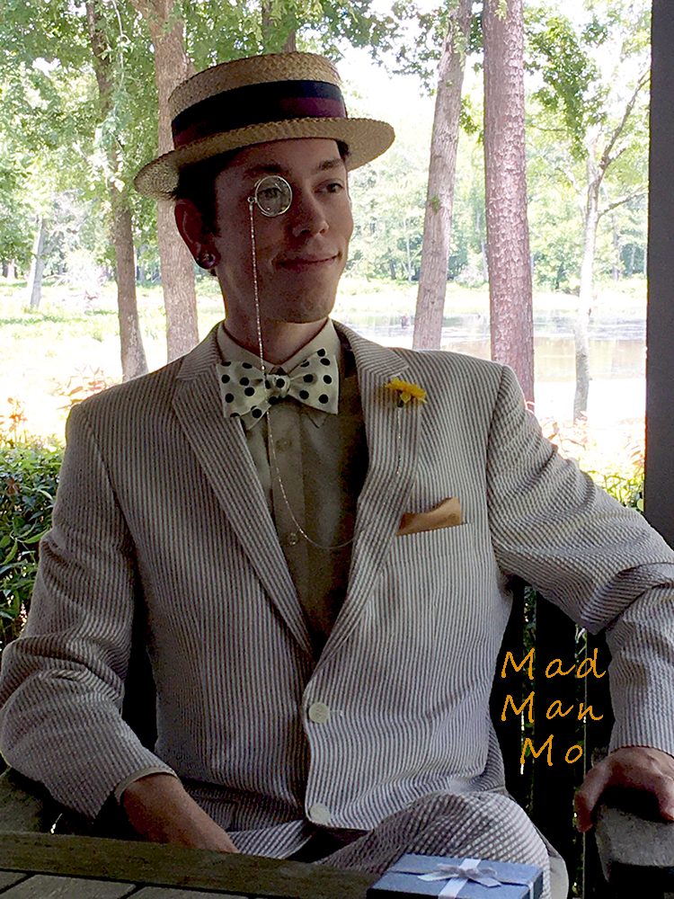 Mad Man Mo in his seersucker suit at a local Art showing