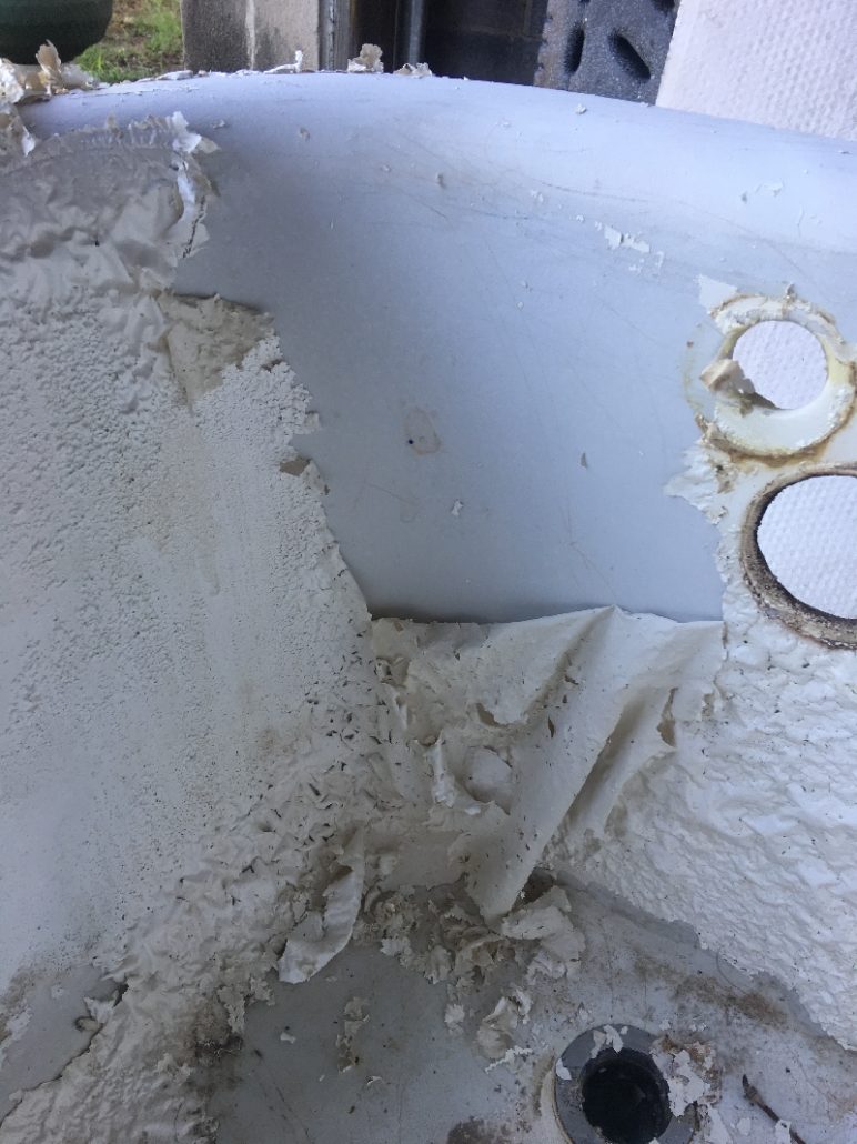 photgraph by Jaymz Onion 2019 shows paint being chemically stripped - an additional service charge at www.joyofstcroix.com